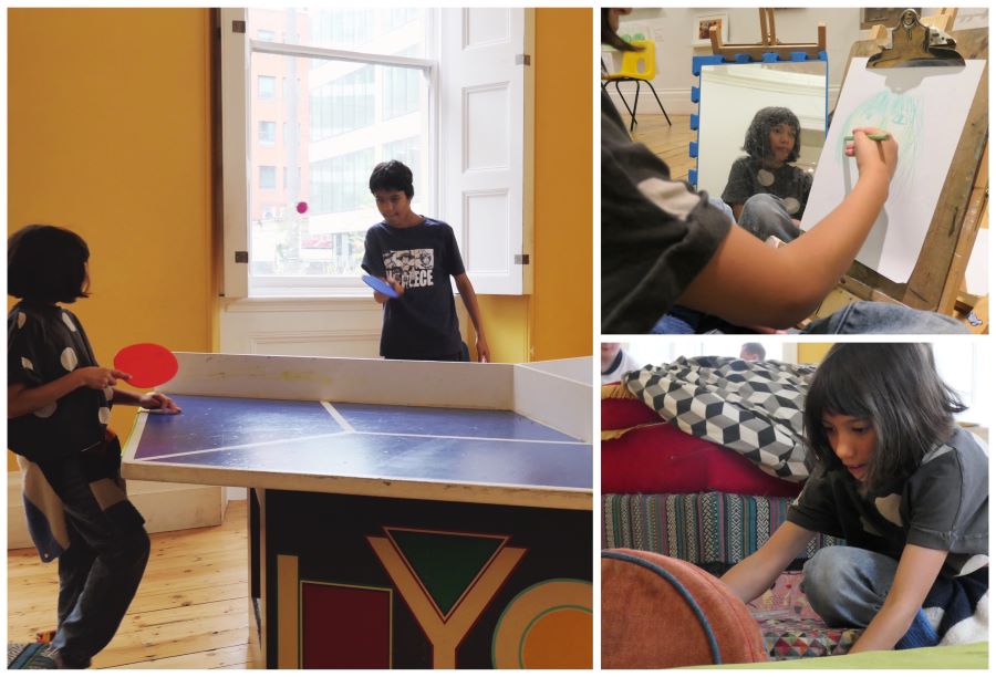 Kids enjoying family facilities at Manchester Art Gallery, including ping pong, drawing and den building