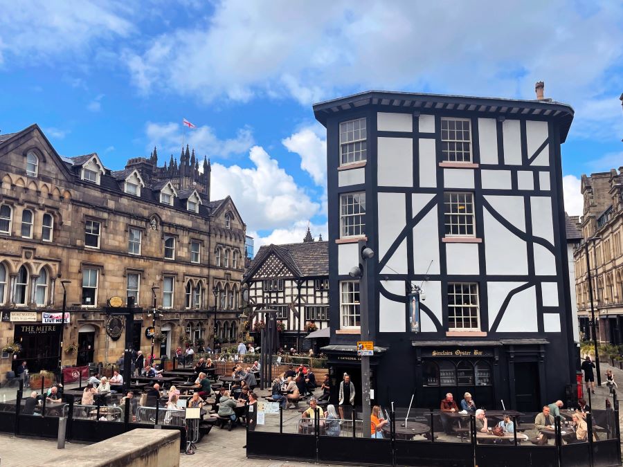 A street scene showing tudor buildings in Manchester